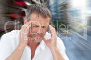 Composite image of man with headache