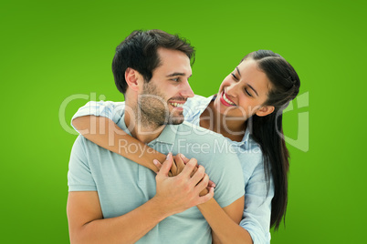Composite image of cute couple smiling at each other