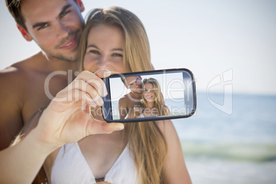 Couple taking selfie on smartphone