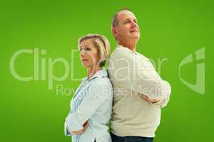 Composite image of mature couple standing and thinking