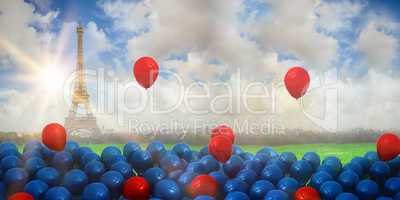 Composite image of red and blue balloons