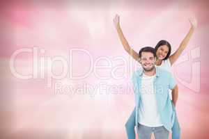 Composite image of happy casual man giving pretty girlfriend pig