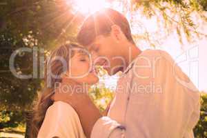 Cute couple hugging and smiling in the park