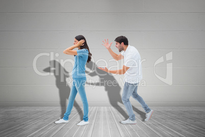 Composite image of angry boyfriend shouting at girlfriend