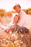 Attractive couple relaxing in the countryside