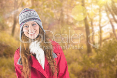 Composite image of pretty redhead in warm clothing