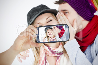 Couple taking selfie on smartphone