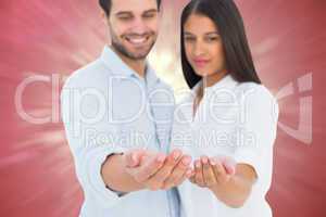 Composite image of attractive young couple holding their hands o