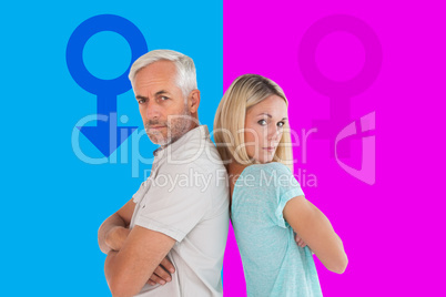 Composite image of unhappy couple not speaking to each other