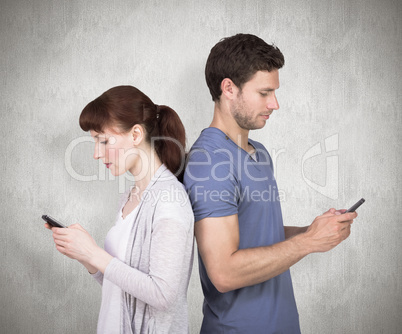 Composite image of couple both sending text messages