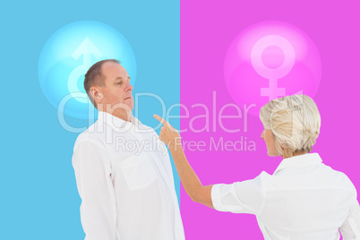Composite image of angry older couple arguing with each other Composite image of angry older couple arguing with each other