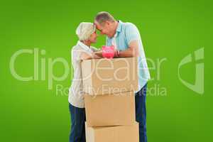 Composite image of older couple smiling at each other with movin