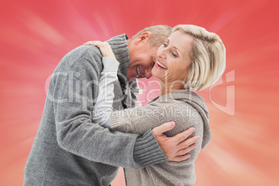 Composite image of happy mature couple in winter clothes