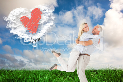 Composite image of man picking up his partner while hugging here