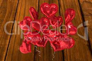 Composite image of heart balloons