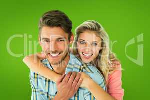 Composite image of attractive couple embracing and smiling at ca