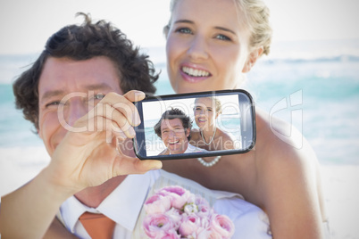 Couple taking selfie on smartphone