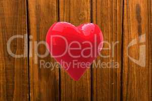 Bright red heart shaped balloon