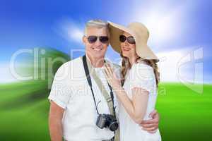 Composite image of vacationing couple