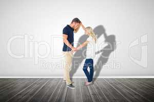 Composite image of angry man overpowering his girlfriend