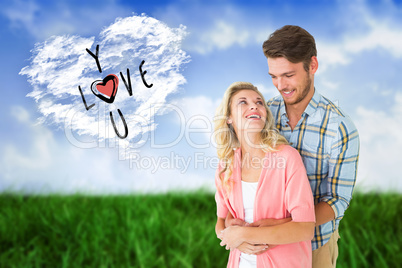 Composite image of attractive young couple embracing and smiling