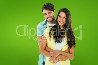 Composite image of happy casual couple smiling at camera