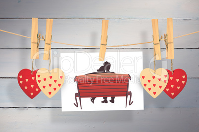 Composite image of couple on bench