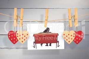 Composite image of couple on bench