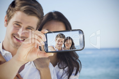 Couple taking selfie on smartphone