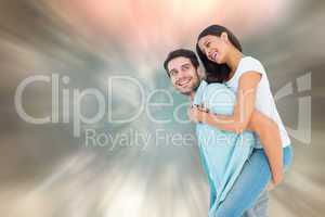 Composite image of happy casual man giving pretty girlfriend pig