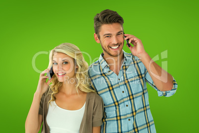 Composite image of attractive couple talking on their smartphone