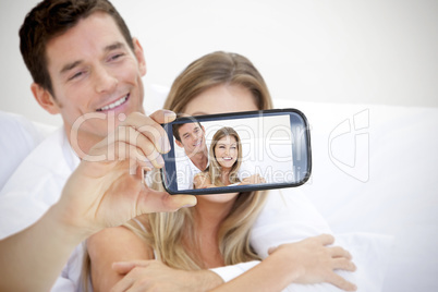 Couple taking selfie on smartphone