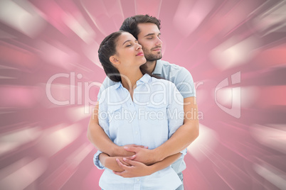 Composite image of cute couple embracing with eyes closed