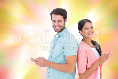 Composite image of happy couple sending text messages