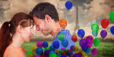 Composite image of couple looking at each other