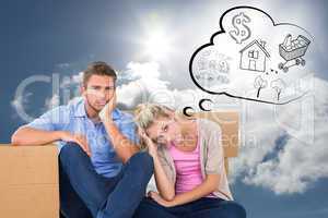 Composite image of unhappy young couple sitting beside moving bo