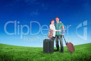 Composite image of happy couple going on holiday