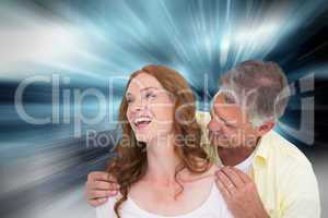 Composite image of casual couple laughing together