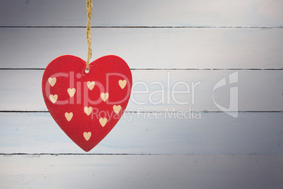 Composite image of cute heart decoration