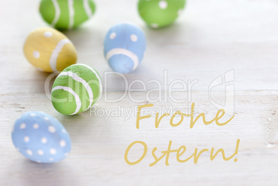 Blue Green And Yellow Easter Eggs With German Text Frohe Ostern Means Happy Easter