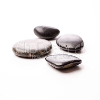 Massage stones on white