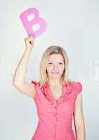 smiling business woman is holding a letter