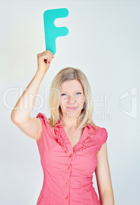 smiling business woman is holding a letter