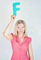 smiling business woman is holding a letter