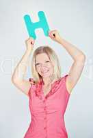 smiling business woman is holding a letter