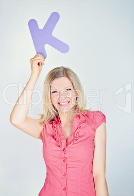 smiling business woman is holding a letter