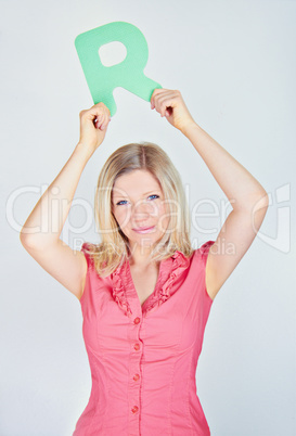 smiling business woman is holding a letter