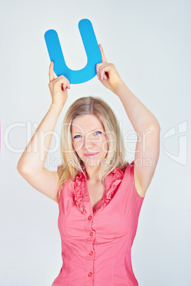 smiling business woman is holding a letter