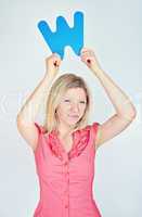 smiling business woman is holding a letter