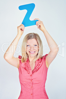 smiling business woman is holding a letter